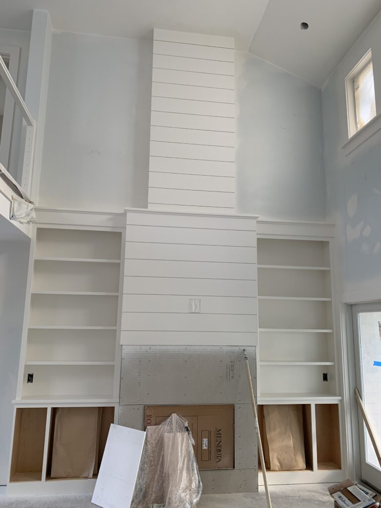 built-in cabinet with shiplap